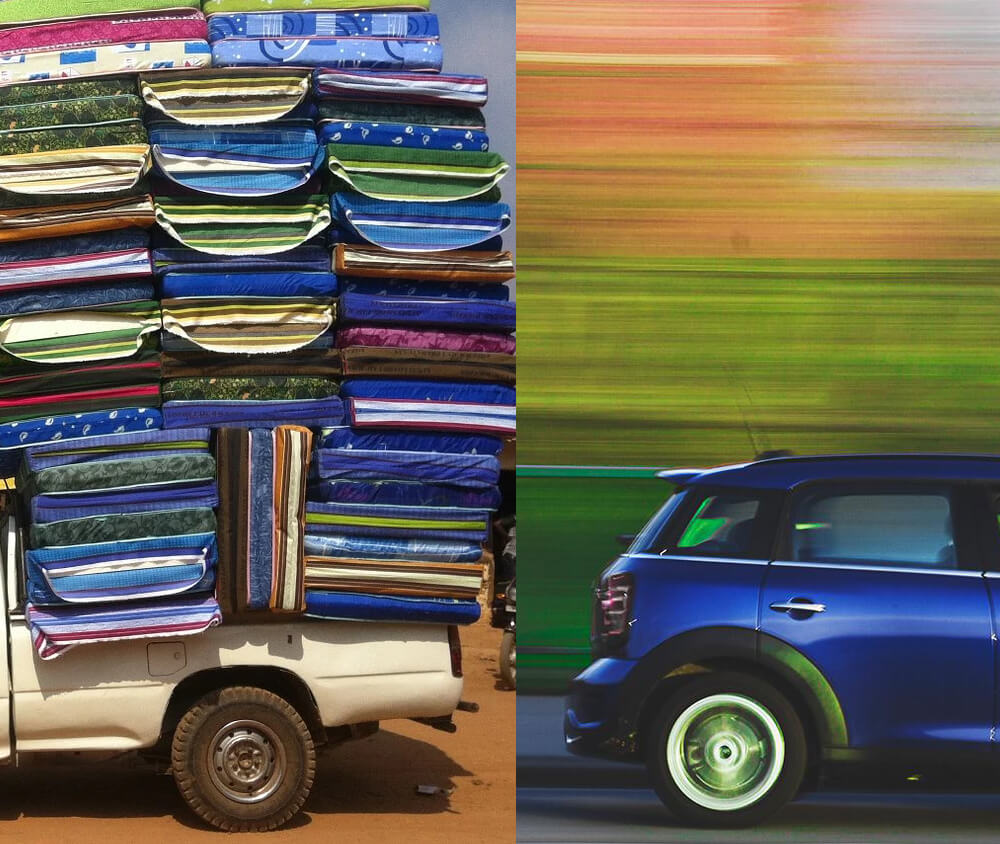 a truck with too much loaded on the bed, juxtaposed next to a mini cooper moving very fast